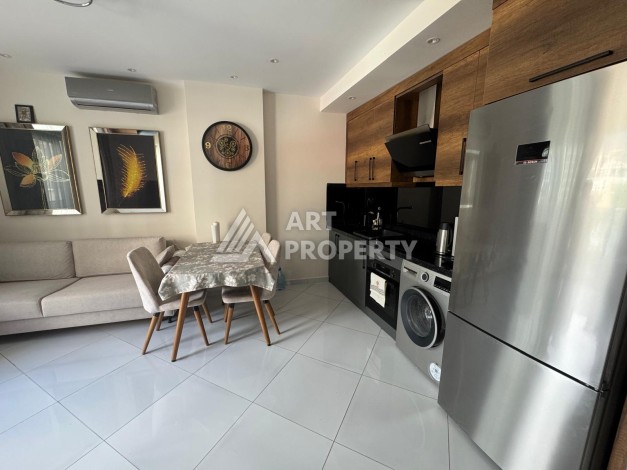 Квартира 1+1 в престижном ЖК Махмутлара, 55 кв.м. - Ракурс 11
