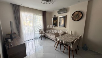 Квартира 1+1 в престижном ЖК Махмутлара, 55 кв.м. - Ракурс 13