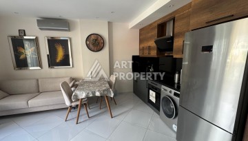 Квартира 1+1 в престижном ЖК Махмутлара, 55 кв.м. - Ракурс 14