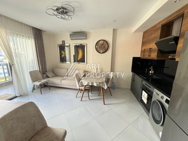Квартира 1+1 в престижном ЖК Махмутлара, 55 кв.м. - Ракурс 14