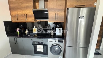 Квартира 1+1 в престижном ЖК Махмутлара, 55 кв.м. - Ракурс 16