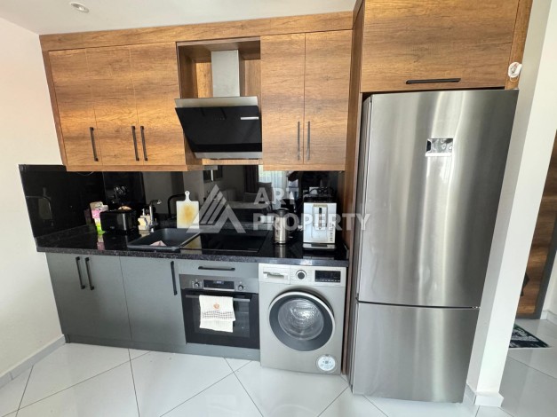 Квартира 1+1 в престижном ЖК Махмутлара, 55 кв.м. - Ракурс 15