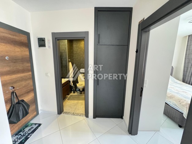 Квартира 1+1 в престижном ЖК Махмутлара, 55 кв.м. - Ракурс 16