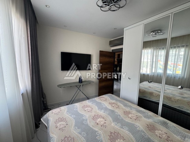Квартира 1+1 в престижном ЖК Махмутлара, 55 кв.м. - Ракурс 19