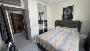 Квартира 1+1 в престижном ЖК Махмутлара, 55 кв.м. - Ракурс 21