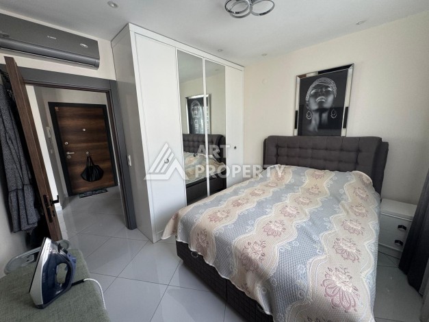 Квартира 1+1 в престижном ЖК Махмутлара, 55 кв.м. - Ракурс 20