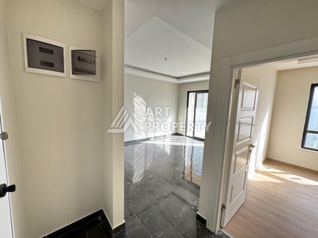 Квартира 1+1 в центре Махмутлара, 55 кв.м. Современный ЖК - Ракурс 1