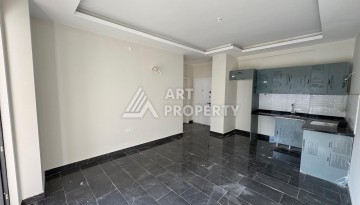 Квартира 1+1 в центре Махмутлара, 55 кв.м. Современный ЖК - Ракурс 4