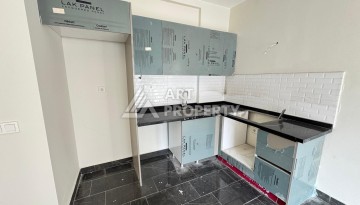 Квартира 1+1 в центре Махмутлара, 55 кв.м. Современный ЖК - Ракурс 6