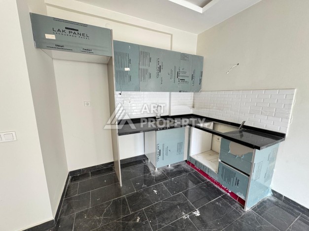 Квартира 1+1 в центре Махмутлара, 55 кв.м. Современный ЖК - Ракурс 5