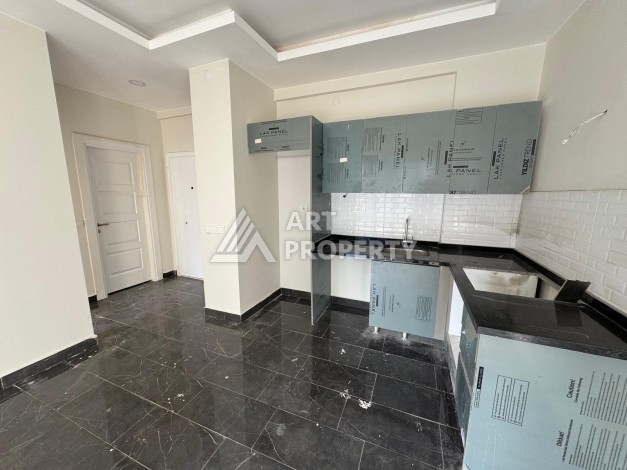 Квартира 1+1 в центре Махмутлара, 55 кв.м. Современный ЖК - Ракурс 7