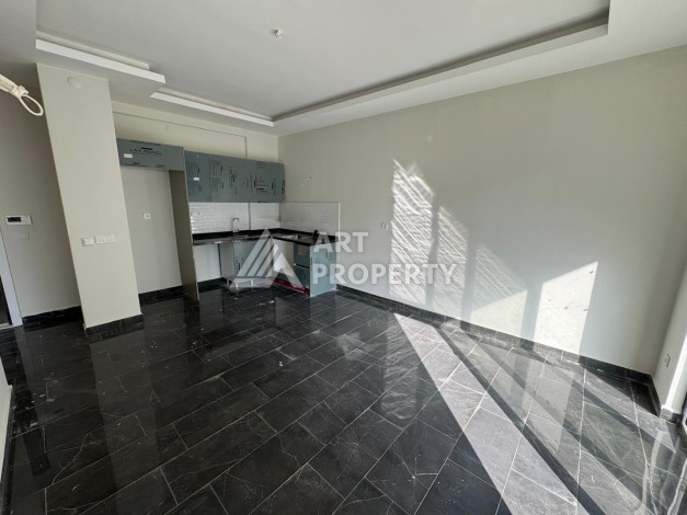 Квартира 1+1 в центре Махмутлара, 55 кв.м. Современный ЖК - Ракурс 8
