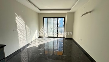 Квартира 1+1 в центре Махмутлара, 55 кв.м. Современный ЖК - Ракурс 10