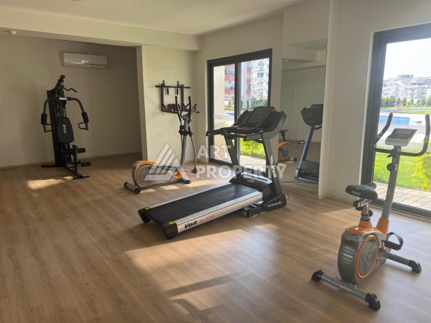 Квартира 1+1 в центре Махмутлара, 55 кв.м. Современный ЖК - Ракурс 11