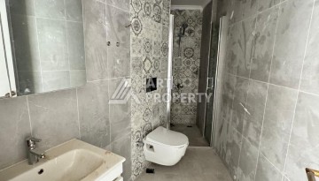 Квартира 1+1 в центре Махмутлара, 55 кв.м. Современный ЖК - Ракурс 13