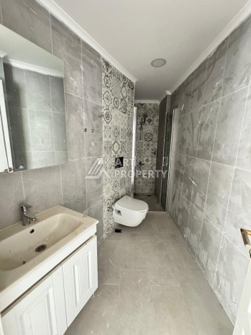 Квартира 1+1 в центре Махмутлара, 55 кв.м. Современный ЖК - Ракурс 12