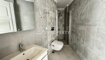 Квартира 1+1 в центре Махмутлара, 55 кв.м. Современный ЖК - Ракурс 14
