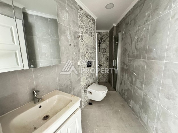 Квартира 1+1 в центре Махмутлара, 55 кв.м. Современный ЖК - Ракурс 13
