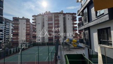 Квартира 1+1 в центре Махмутлара, 55 кв.м. Современный ЖК - Ракурс 16