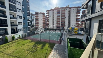Квартира 1+1 в центре Махмутлара, 55 кв.м. Современный ЖК - Ракурс 17