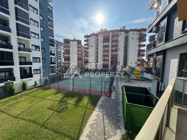 Квартира 1+1 в центре Махмутлара, 55 кв.м. Современный ЖК - Ракурс 16