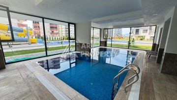 Квартира 1+1 в центре Махмутлара, 55 кв.м. Современный ЖК - Ракурс 21
