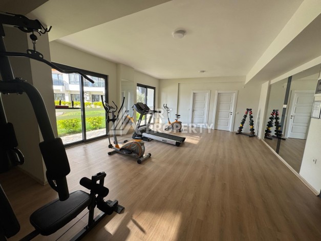 Квартира 1+1 в центре Махмутлара, 55 кв.м. Современный ЖК - Ракурс 21