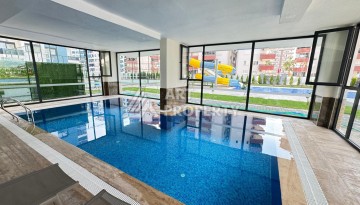 Квартира 1+1 в центре Махмутлара, 55 кв.м. Современный ЖК - Ракурс 24
