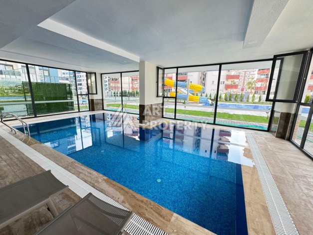 Квартира 1+1 в центре Махмутлара, 55 кв.м. Современный ЖК - Ракурс 23