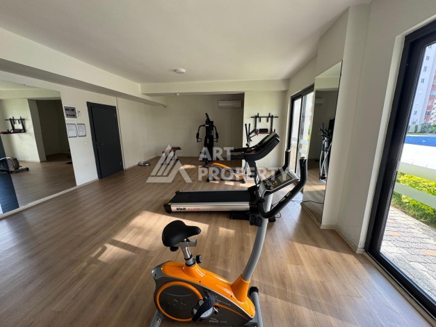 Квартира 1+1 в центре Махмутлара, 55 кв.м. Современный ЖК - Ракурс 24