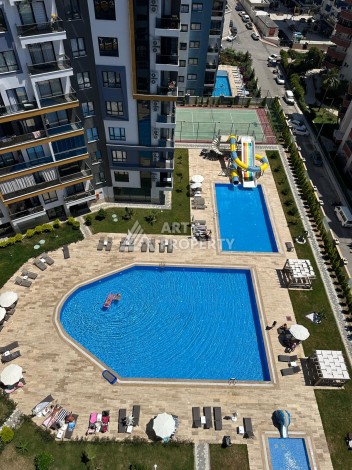 Квартира 1+1 в центре Махмутлара, 55 кв.м. Современный ЖК - Ракурс 25