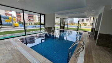 Квартира 1+1 в центре Махмутлара, 55 кв.м. Современный ЖК - Ракурс 33