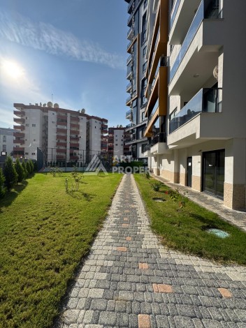 Квартира 1+1 в центре Махмутлара, 55 кв.м. Современный ЖК - Ракурс 48