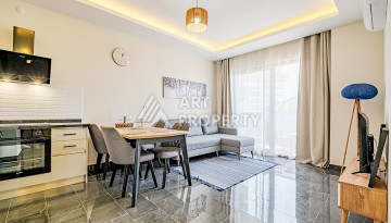 Квартира 1+1 с видом на море в Махмутларе, 65 кв.м. - Ракурс 4
