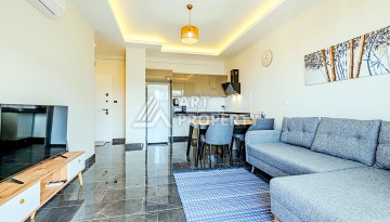 Квартира 1+1 с видом на море в Махмутларе, 65 кв.м. - Ракурс 6