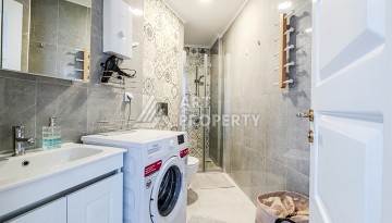 Квартира 1+1 с видом на море в Махмутларе, 65 кв.м. - Ракурс 8
