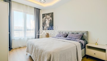 Квартира 1+1 с видом на море в Махмутларе, 65 кв.м. - Ракурс 9