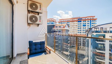 Квартира 1+1 с видом на море в Махмутларе, 65 кв.м. - Ракурс 11