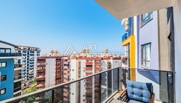 Квартира 1+1 с видом на море в Махмутларе, 65 кв.м. - Ракурс 16