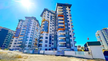Квартира 1+1 с видом на море в Махмутларе, 65 кв.м. - Ракурс 37