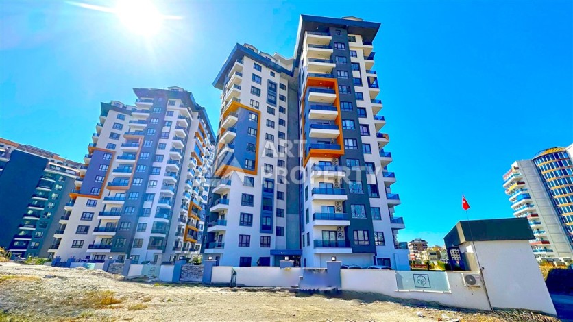 Квартира 1+1 с видом на море в Махмутларе, 65 кв.м. - Ракурс 36