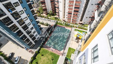 Квартира 1+1 с видом на море в Махмутларе, 65 кв.м. - Ракурс 42