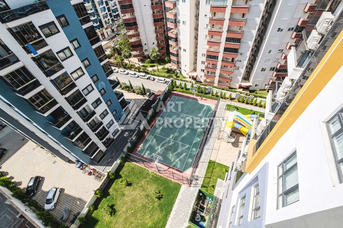 Квартира 1+1 с видом на море в Махмутларе, 65 кв.м. - Ракурс 41