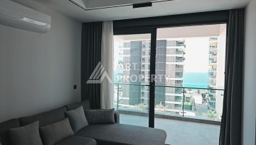 Квартира 1+1 на первой береговой линии в Махмутларе, 55 кв.м. - Ракурс 3