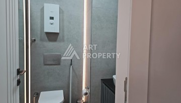 Квартира 1+1 на первой береговой линии в Махмутларе, 55 кв.м. - Ракурс 9
