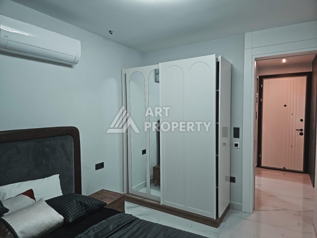 Квартира 1+1 на первой береговой линии в Махмутларе, 55 кв.м. - Ракурс 9