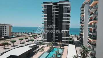 Квартира 1+1 на первой береговой линии в Махмутларе, 55 кв.м. - Ракурс 14