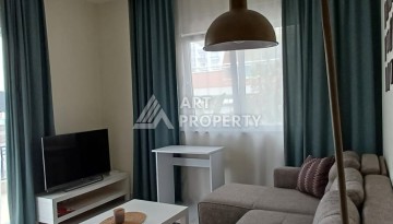 Квартира 1+1 с видом на бассейн в Махмутларе, 50 кв.м. - Ракурс 4