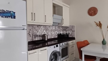 Квартира 1+1 с видом на бассейн в Махмутларе, 50 кв.м. - Ракурс 5