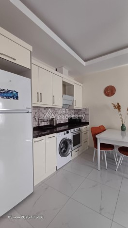 Квартира 1+1 с видом на бассейн в Махмутларе, 50 кв.м. - Ракурс 4